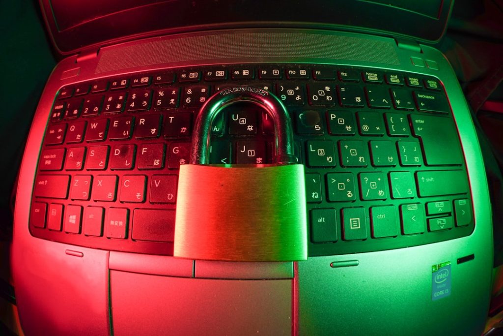 pink-and-silver-padlock-on-black-computer-keyboard-f7az8g7ggbq Cyber security image